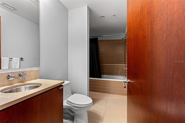 912 Channelside Dr Unit 2320, Tampa, FL 33602 - full bathroom featuring vanity, toilet, tile patterned flooring, and tiled shower / bath