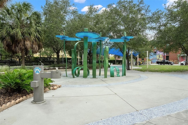 view of property's community with a playground