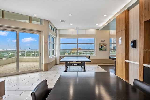 game room featuring plenty of natural light