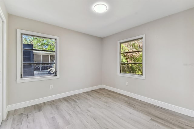 empty room with light wood-type flooring