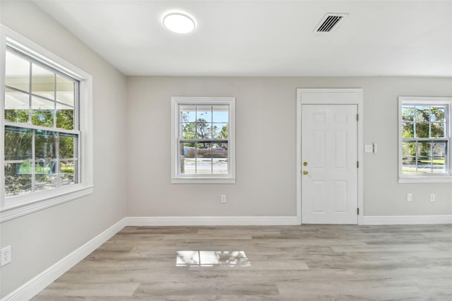 foyer entrance featuring light hardwood / wood-style floors