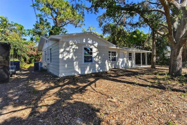 view of front of home featuring central AC unit