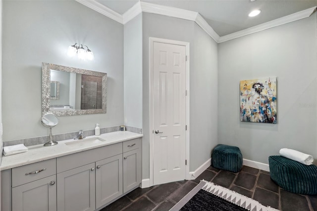 bathroom featuring vanity and ornamental molding