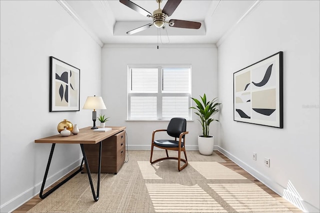 34 Concord Dr, Dunedin, FL 34698 - home office featuring a ceiling fan, light wood-style flooring, baseboards, and crown molding