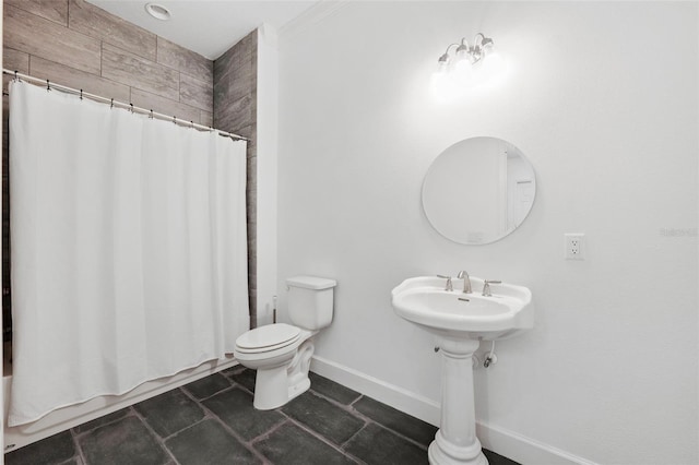 34 Concord Dr, Dunedin, FL 34698 - bathroom with toilet, baseboards, shower / bath combo with shower curtain, and tile patterned flooring