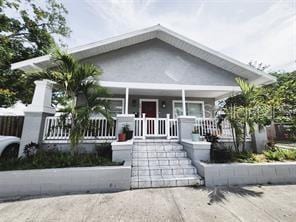 bungalow-style home featuring a porch