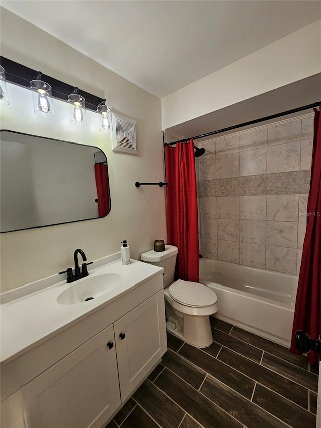 full bathroom featuring vanity, toilet, and shower / bath combo with shower curtain