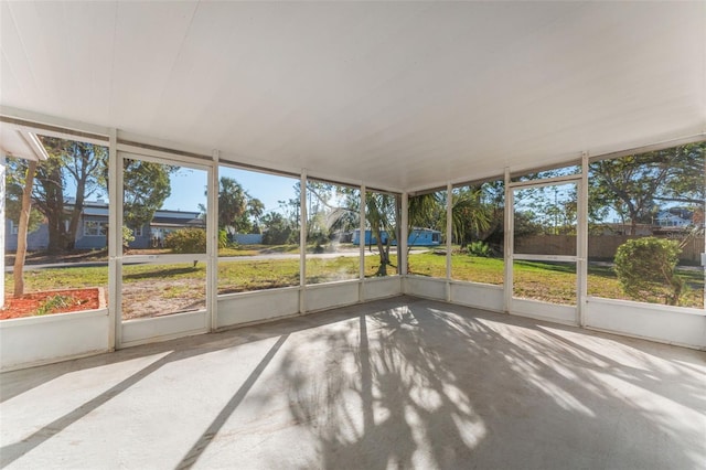 unfurnished sunroom with a healthy amount of sunlight