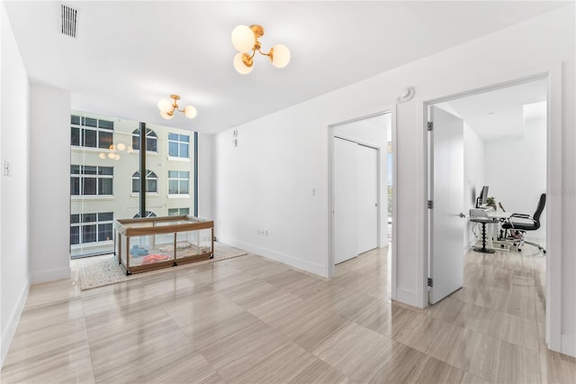 2912 W Santiago St Unit 404, Tampa, FL 33629 - spare room with baseboards and an office area
