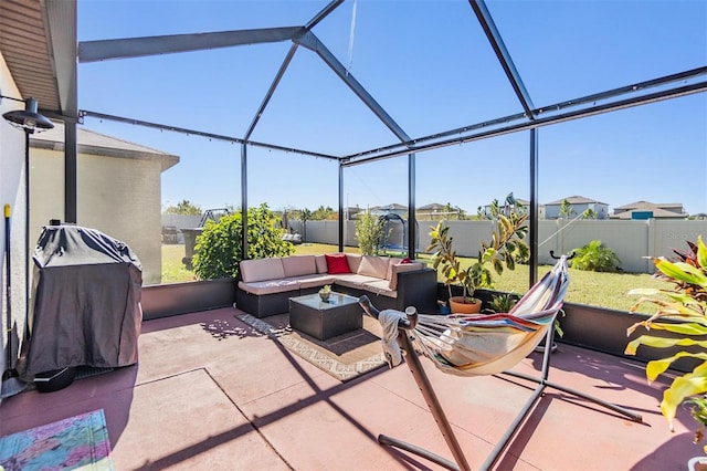 view of patio / terrace with outdoor lounge area and a lanai