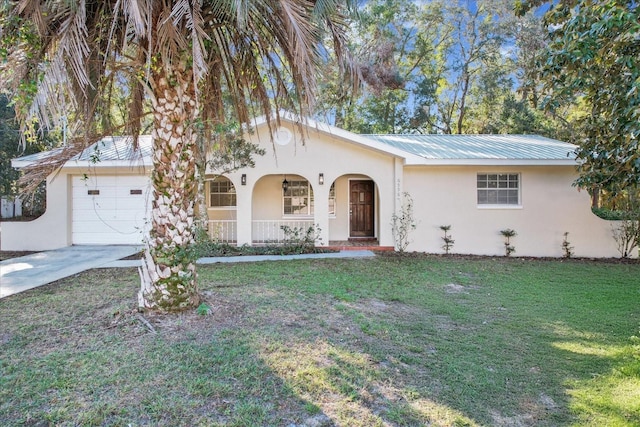 ranch-style house with a front lawn and a garage