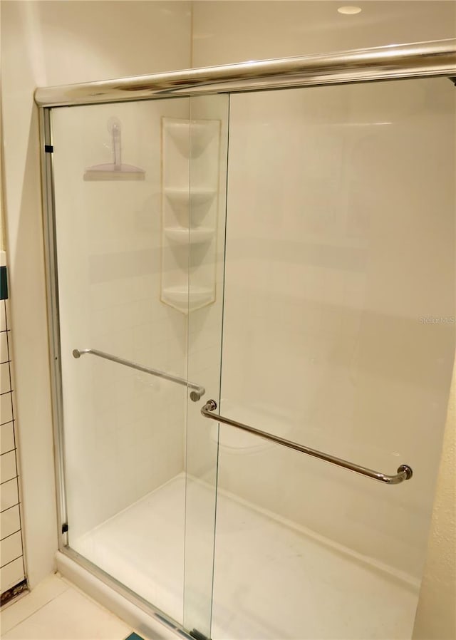 bathroom with an enclosed shower