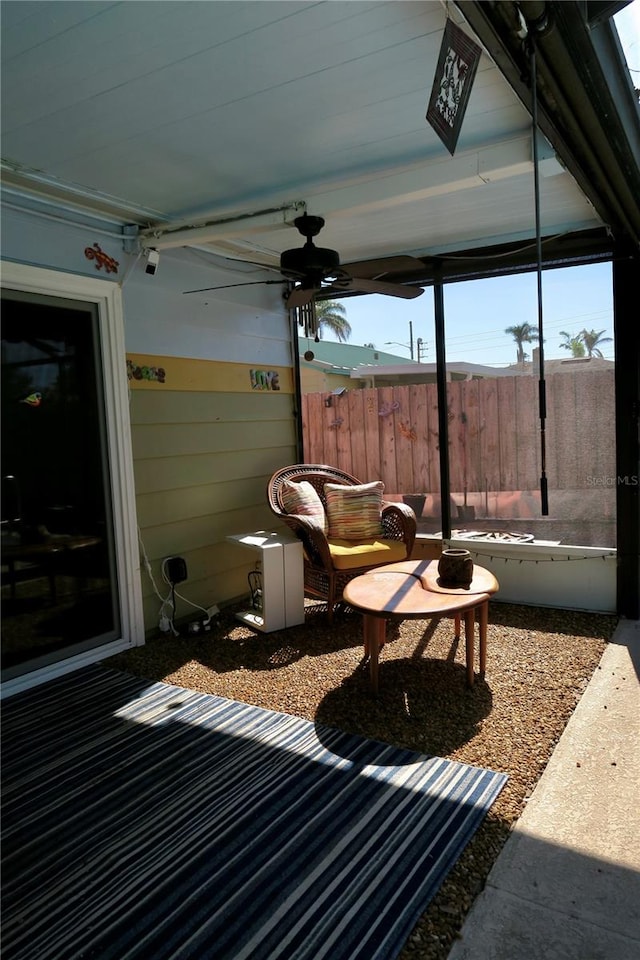 view of patio featuring ceiling fan