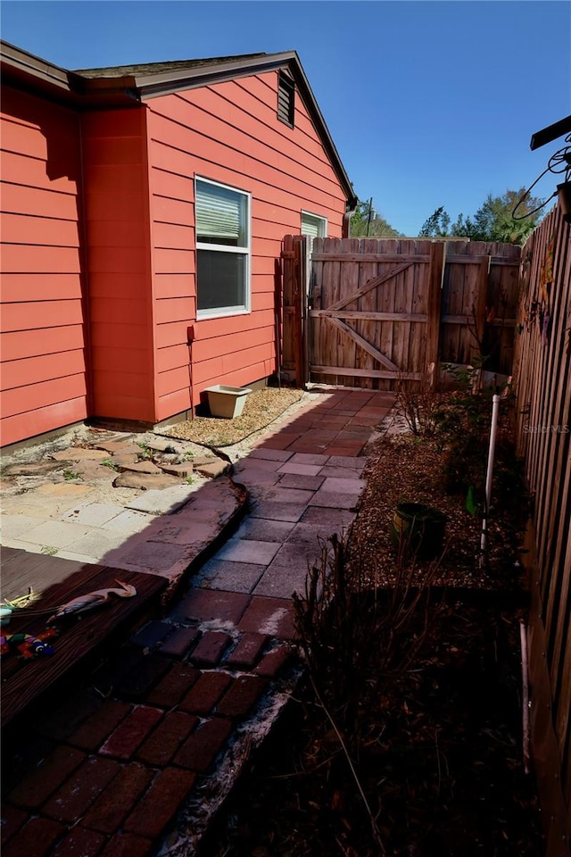 view of property exterior featuring a patio