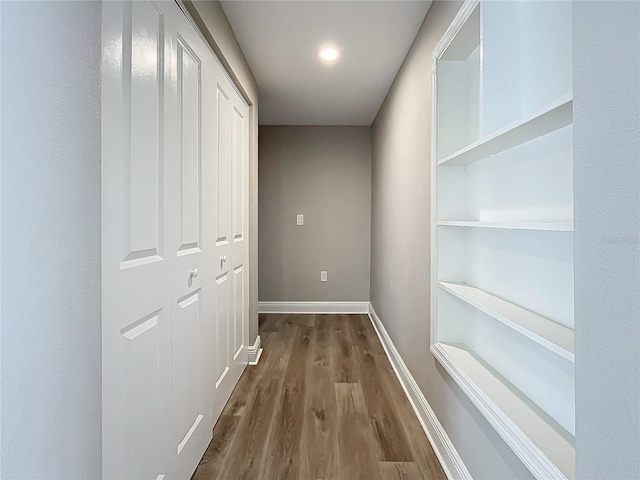 hall featuring dark wood-type flooring