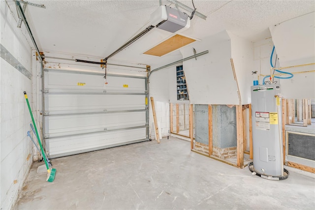 garage with electric water heater and a garage door opener