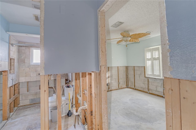 bathroom featuring a textured ceiling