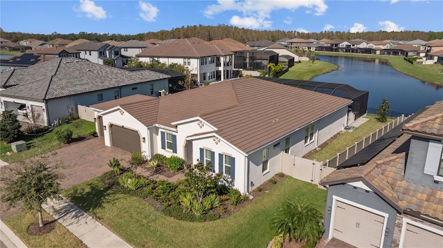 bird's eye view with a water view