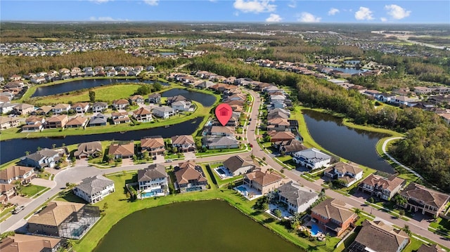 drone / aerial view with a water view