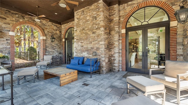 view of patio / terrace with ceiling fan, an outdoor hangout area, and french doors