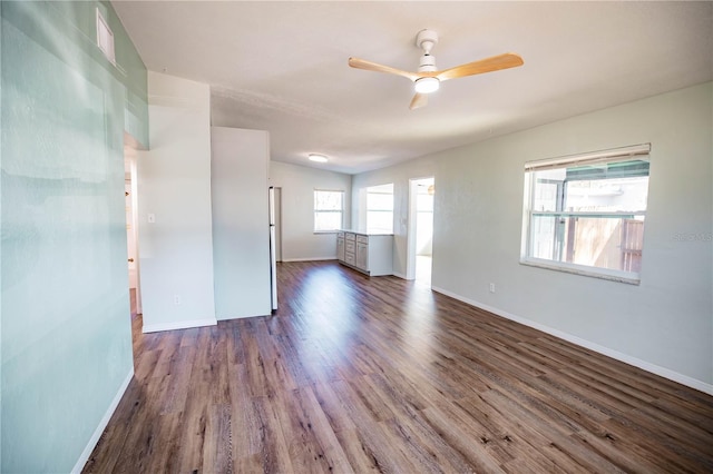 unfurnished room with hardwood / wood-style flooring and ceiling fan