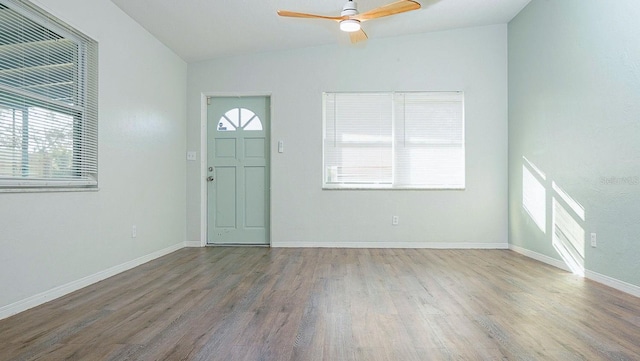 entrance foyer featuring ceiling fan and hardwood / wood-style floors