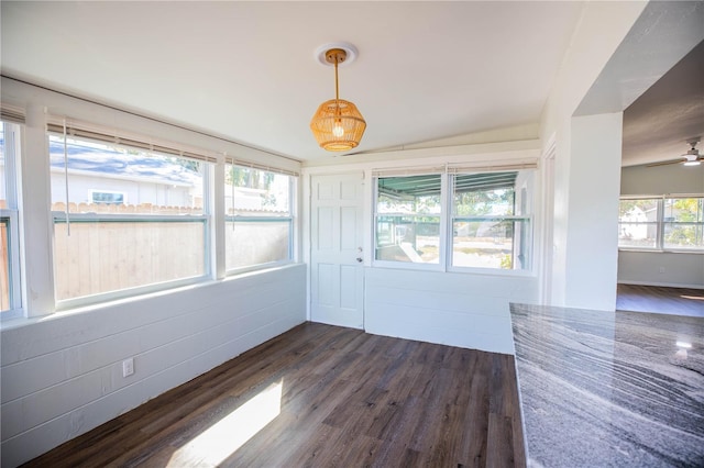 unfurnished sunroom with ceiling fan and lofted ceiling