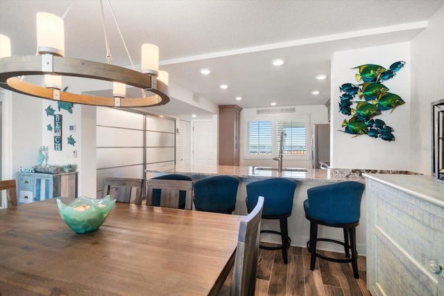 1591 Gulf Blvd Unit 504S, Clearwater Beach, FL 33767 - dining area featuring dark wood-style floors and recessed lighting