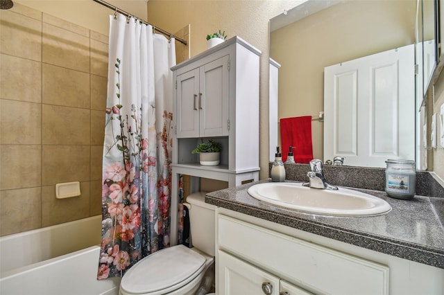 full bathroom with shower / tub combo with curtain, vanity, and toilet