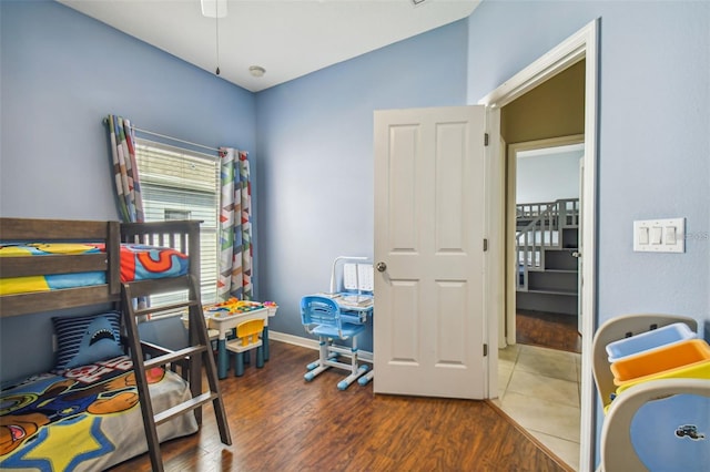 bedroom featuring dark hardwood / wood-style flooring