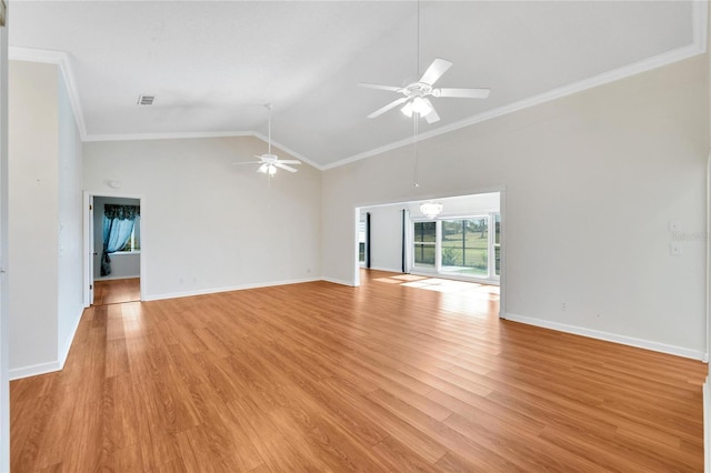 unfurnished room with ceiling fan, crown molding, high vaulted ceiling, and light hardwood / wood-style flooring