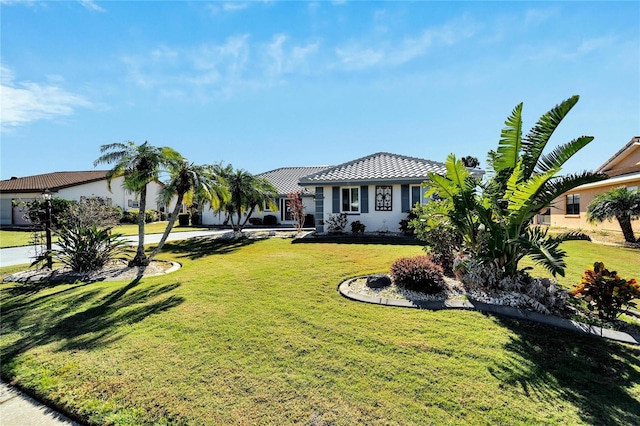 view of front of home featuring a front lawn