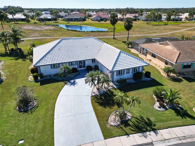 birds eye view of property featuring a water view