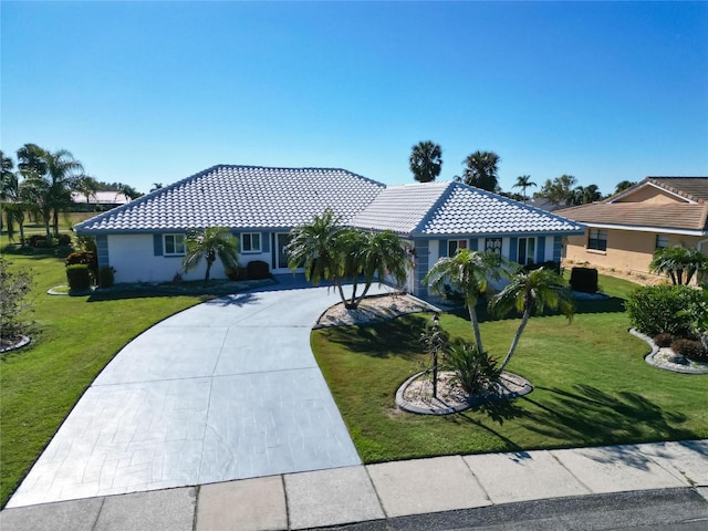 single story home featuring a front yard