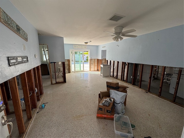 living room featuring ceiling fan