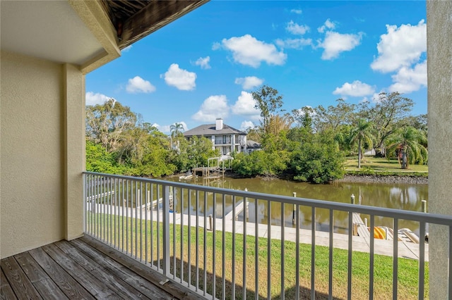 balcony featuring a water view