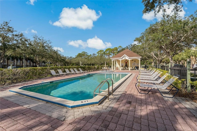 view of swimming pool featuring a patio