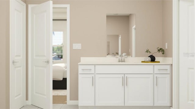 bathroom featuring tile patterned flooring and vanity