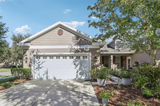 view of front of property featuring a garage