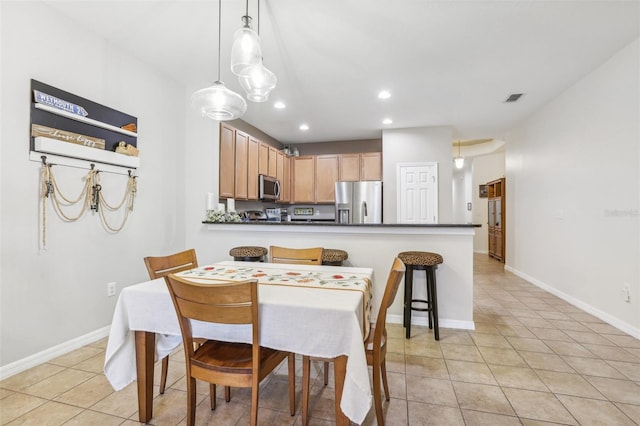 view of tiled dining space