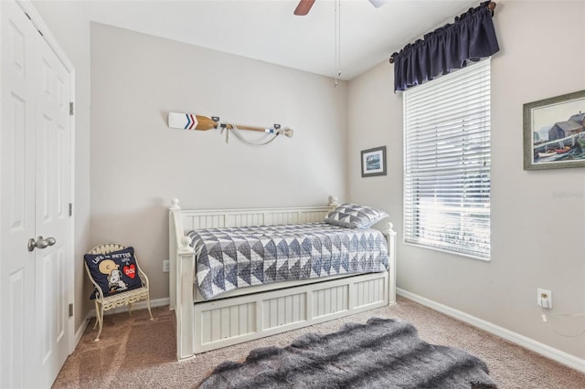 bedroom with carpet floors, a closet, and ceiling fan