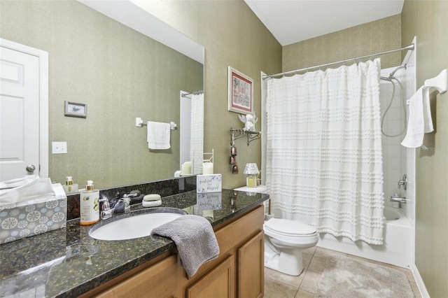 full bathroom featuring toilet, shower / tub combo, vanity, and tile patterned floors