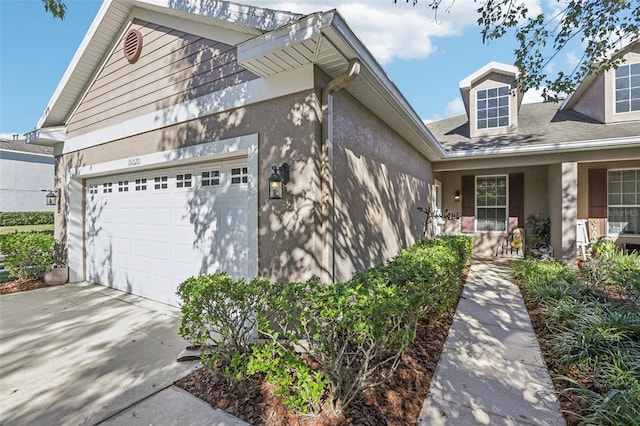 front of property with a garage