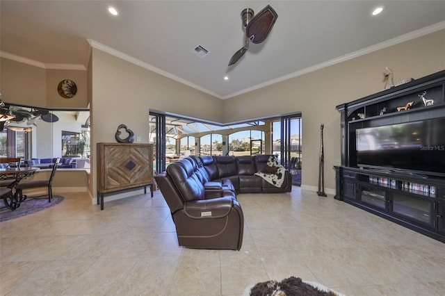 living room featuring ceiling fan and crown molding