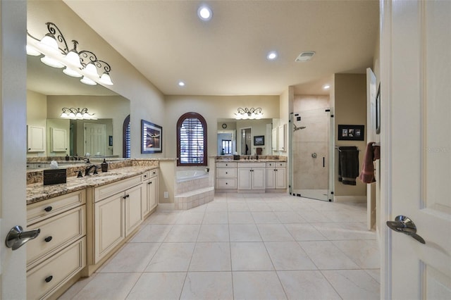 bathroom featuring vanity, separate shower and tub, and tile patterned flooring