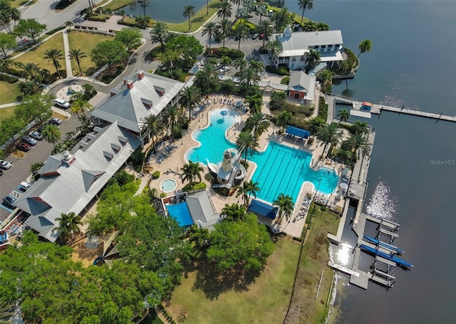 birds eye view of property with a water view