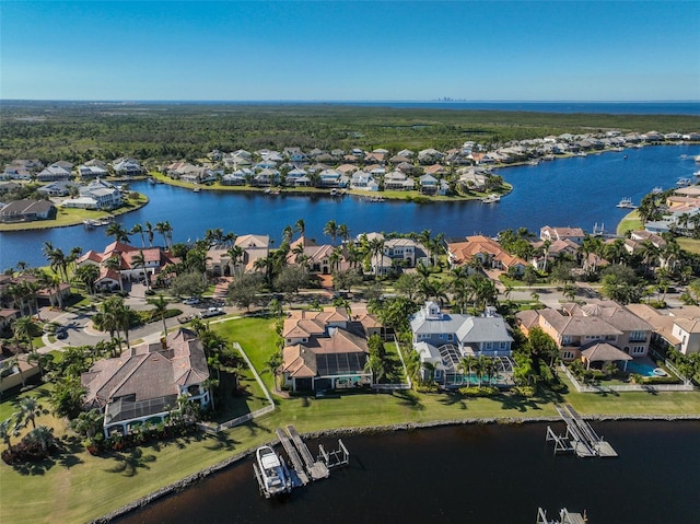 aerial view featuring a water view and a residential view