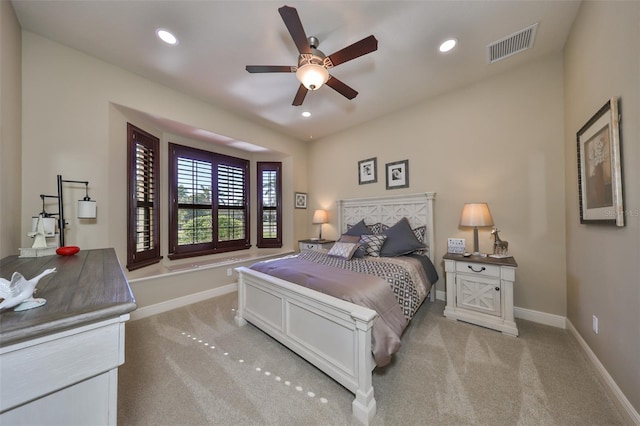 bedroom featuring recessed lighting, carpet, visible vents, and baseboards