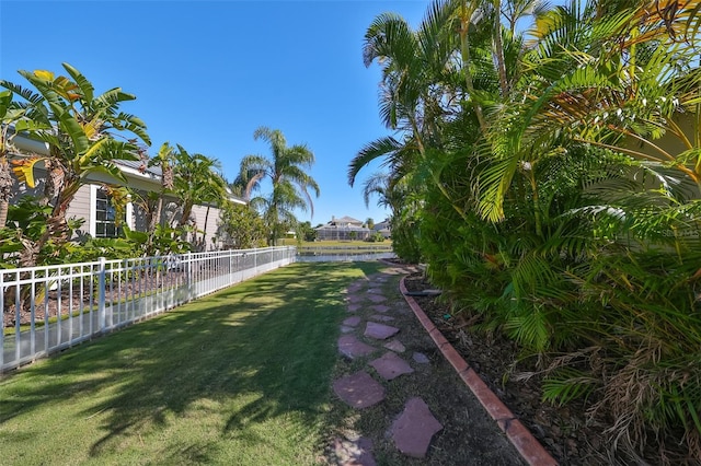 view of yard featuring fence