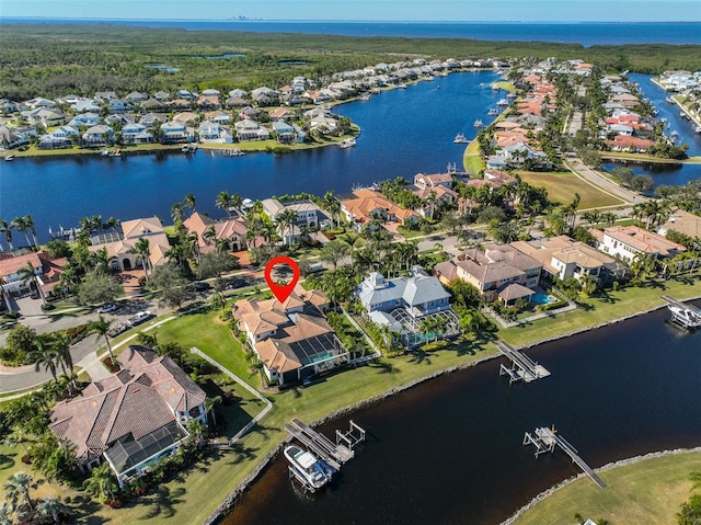 aerial view with a water view and a residential view